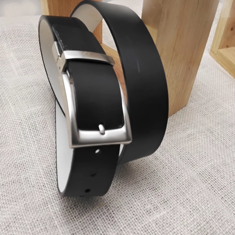 Source unknown -men's black leather belt